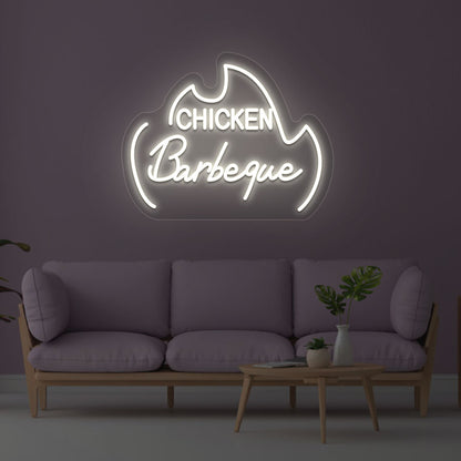 Image of a chicken barbeque neon sign mounted on a wall in white color.