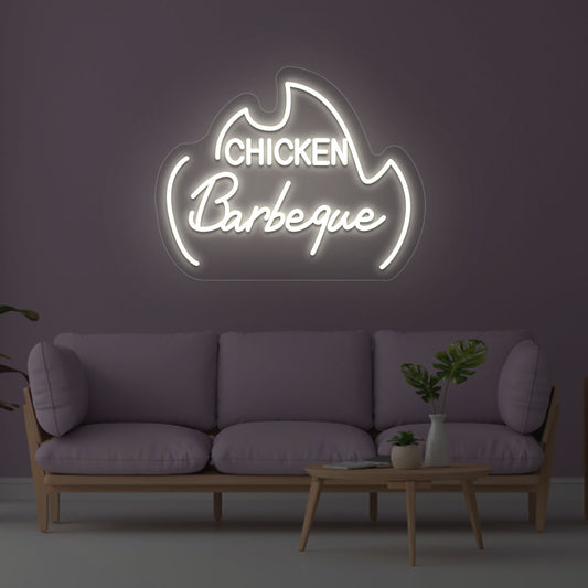Image of a chicken barbeque neon sign mounted on a wall in white color.