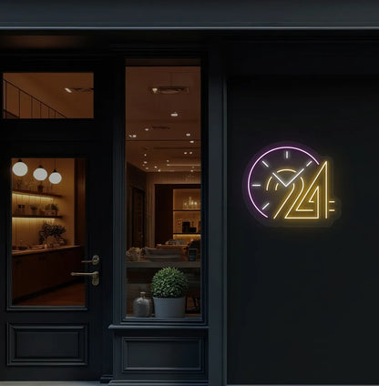 Stylish "24 hour clock" neon sign in orange mounted on storefront wall.