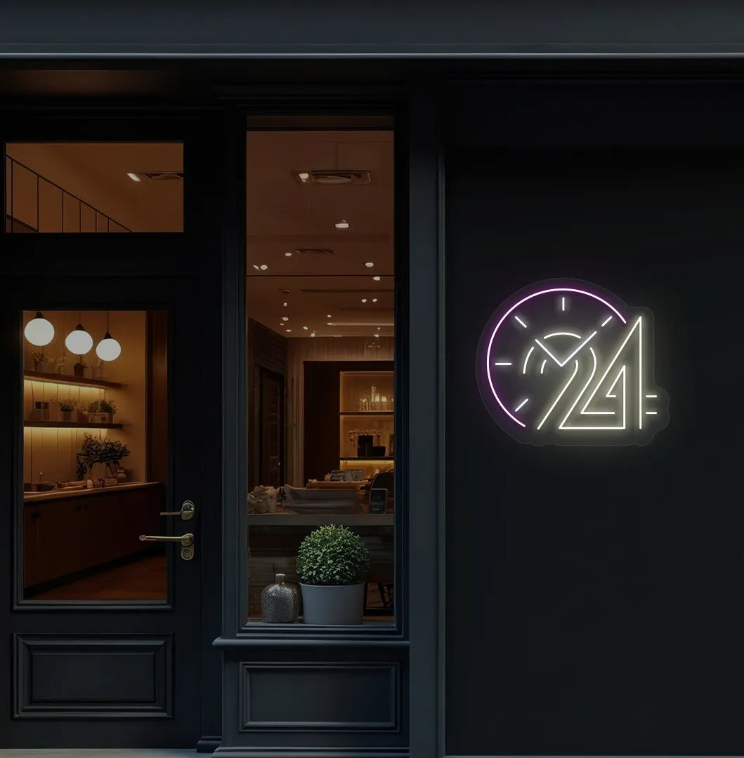 Stylish "24 hour clock" neon sign in warm white mounted on storefront wall.