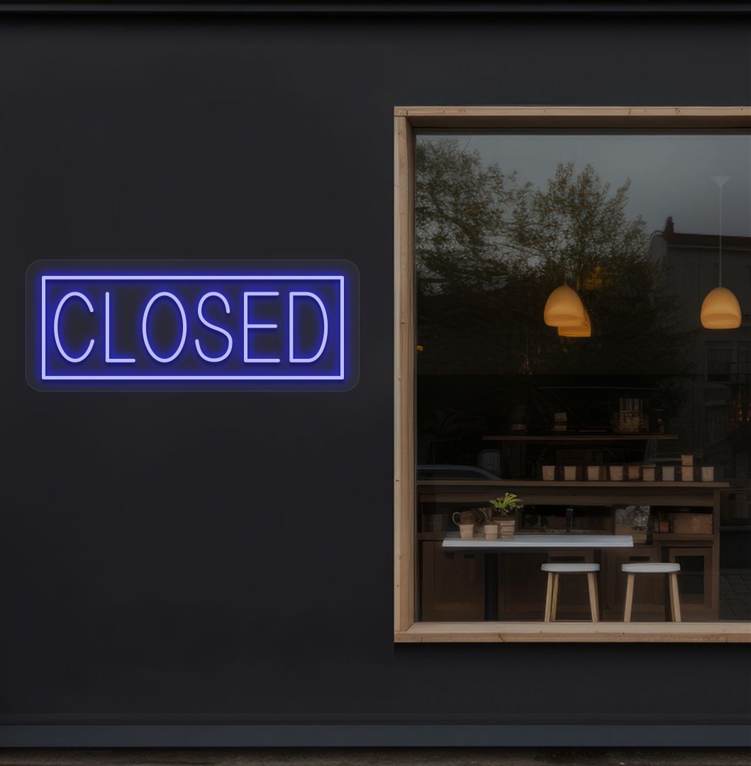 Image of a closed neon sign glowing on shop exterior wall in blue color.