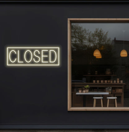 Retail shop outdoor wall with closed neon sign in warm white. Perfect for storefronts and commercial spaces.