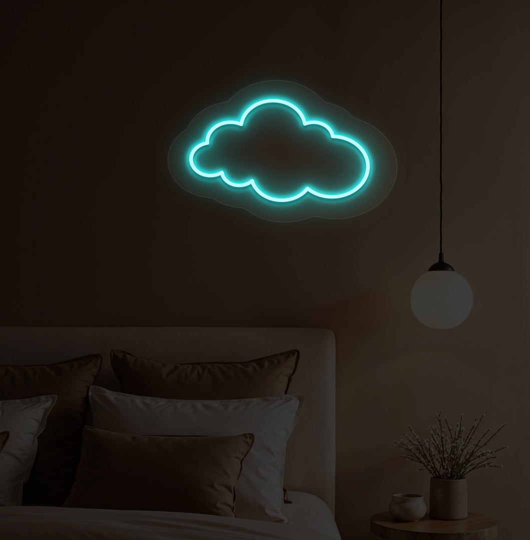 Image of a cloud LED neon light in ice blue color on a kid's bedroom wall.