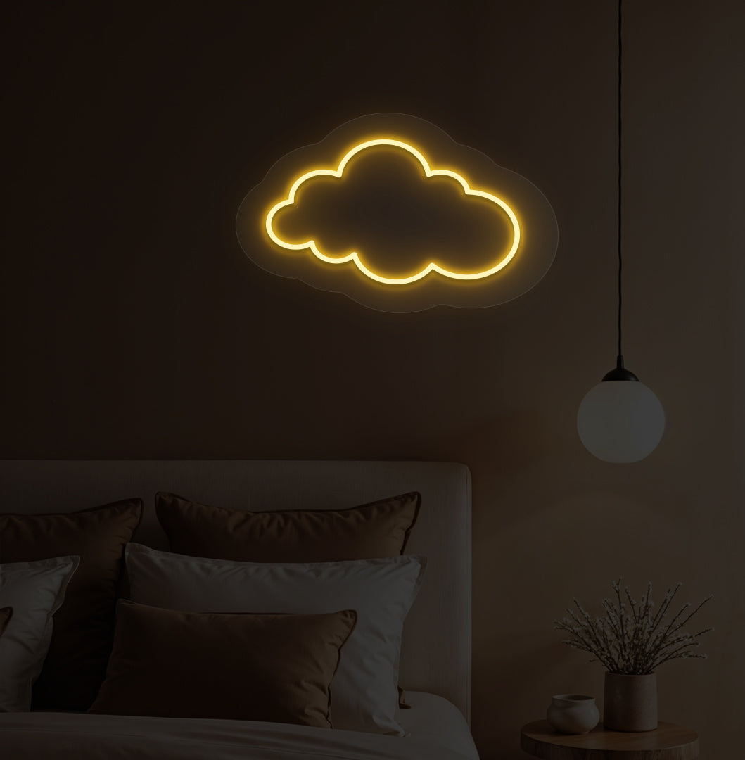 Playroom wall with orange cloud LED neon sign decor.