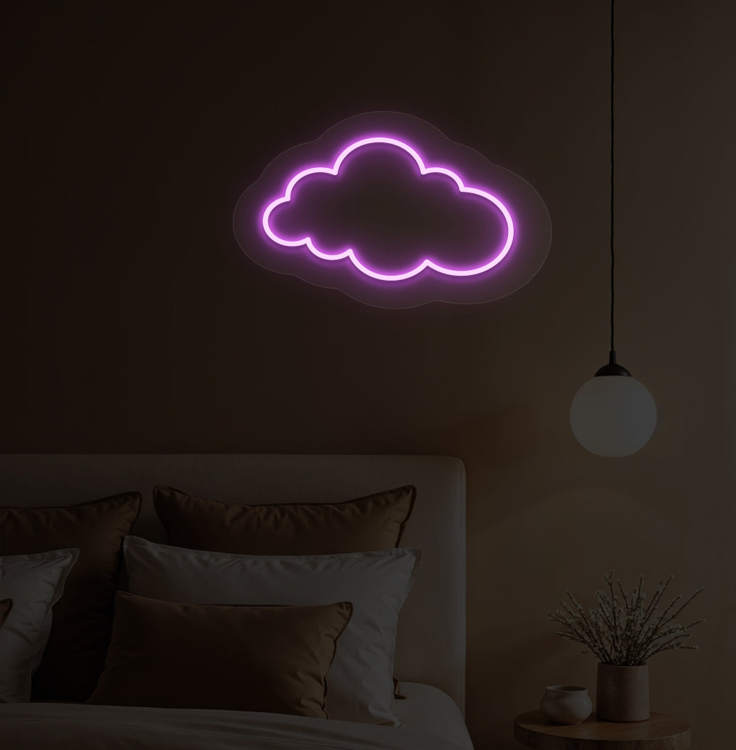 Image of a cloud LED neon light in purple color on a kid's bedroom wall.