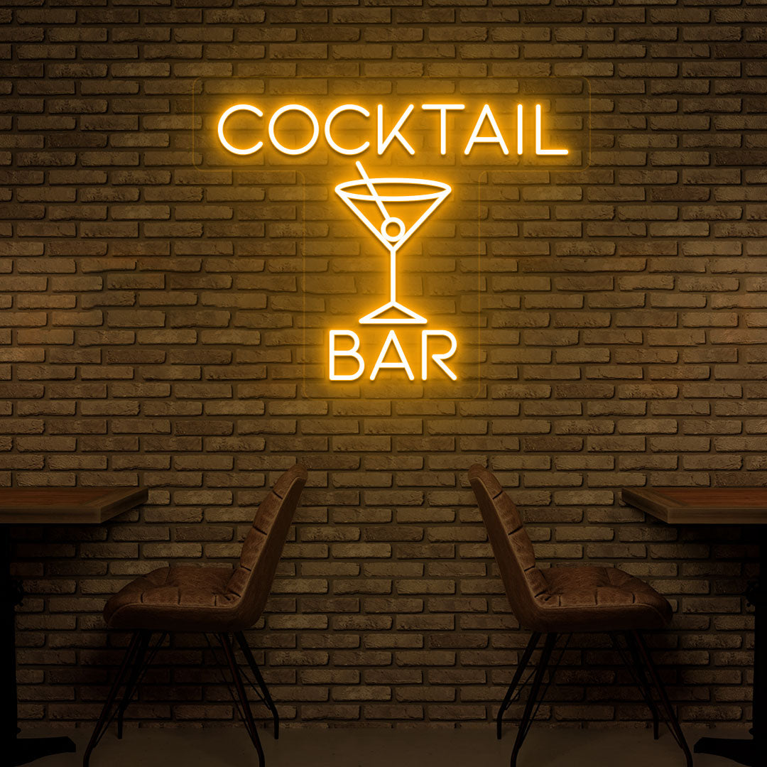 Image of a cocktail bar LED neon sign with a cocktail glass glowing on the bar wall in orange color.