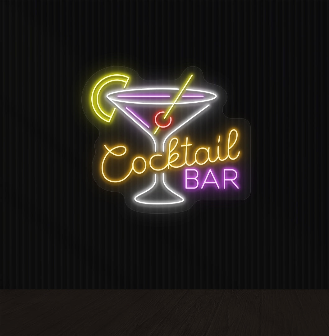 Image of an orange cocktail bar neon sign mounted on a wall with a martini glass, straw, and strawberry.