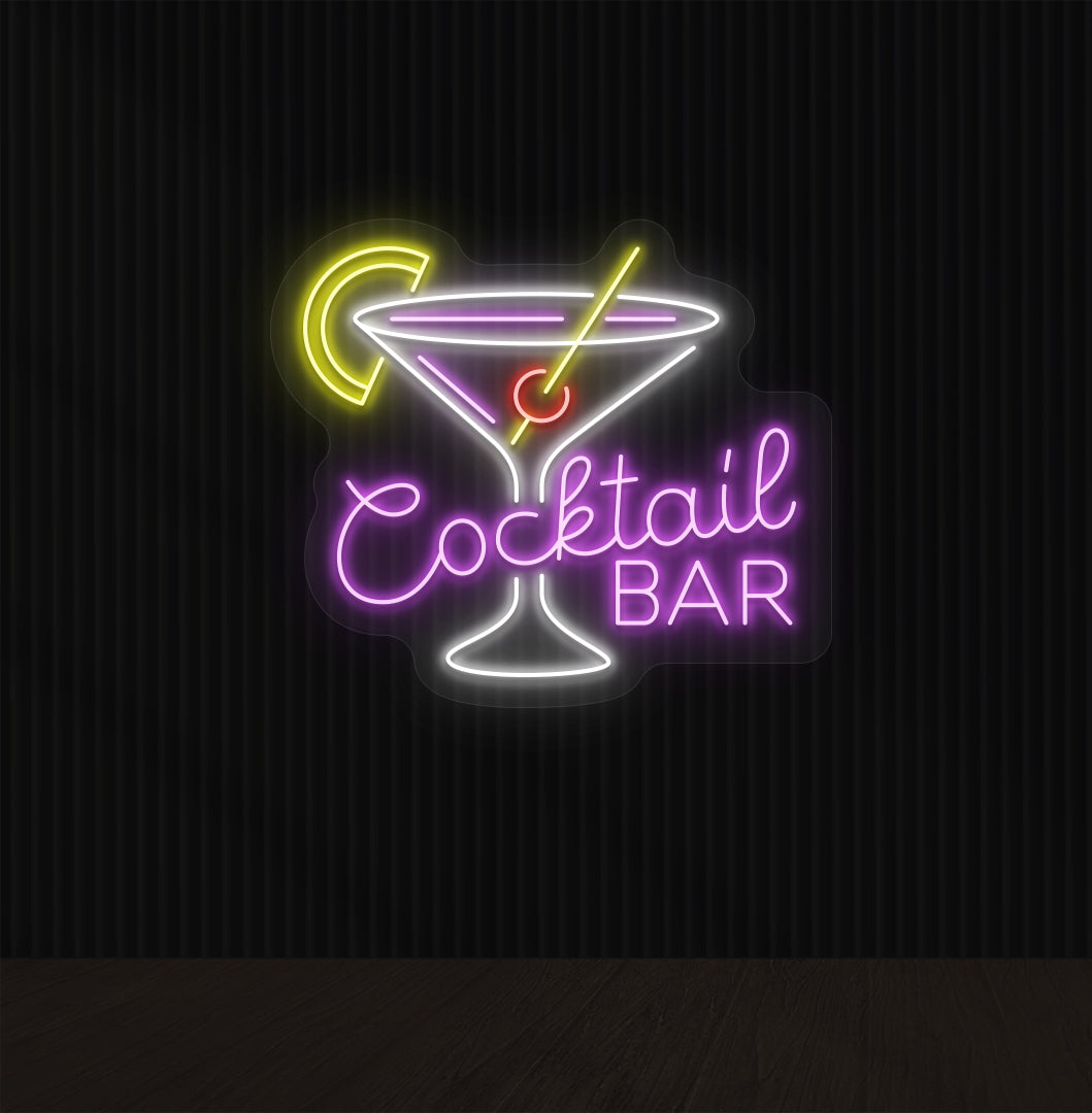 A cocktail bar neon sign with a cocktail glass, straw, and lemon glowing in the middle of the design in purple light.