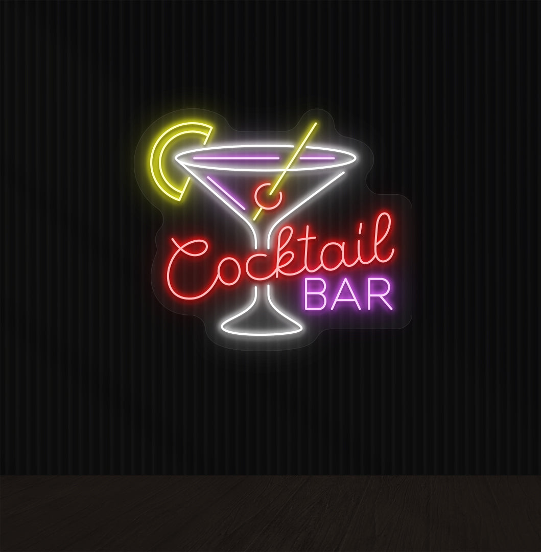 Image of a red cocktail bar neon sign mounted on a wall with a martini glass, straw, and strawberry.