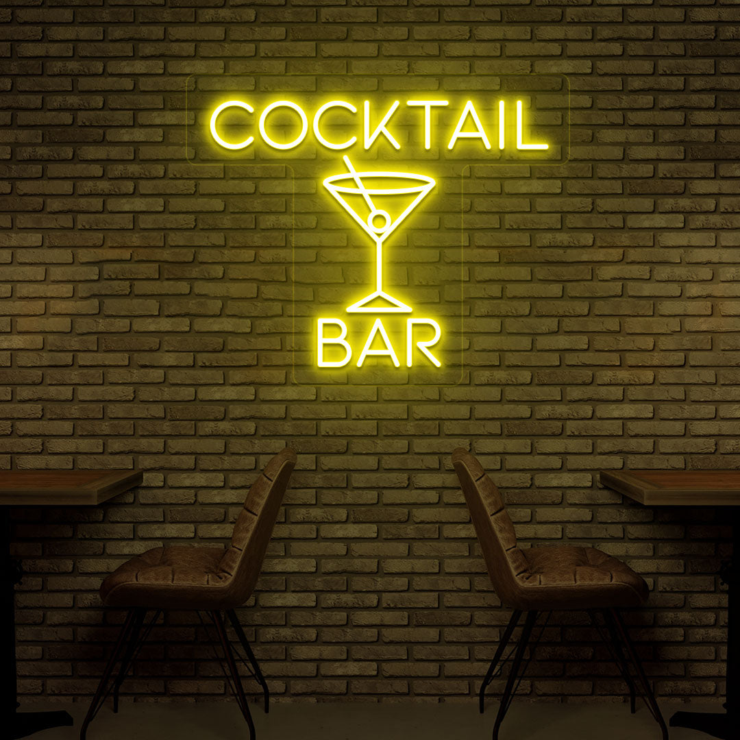 Bar wall with yellow LED cocktail neon sign and cocktail glass design.