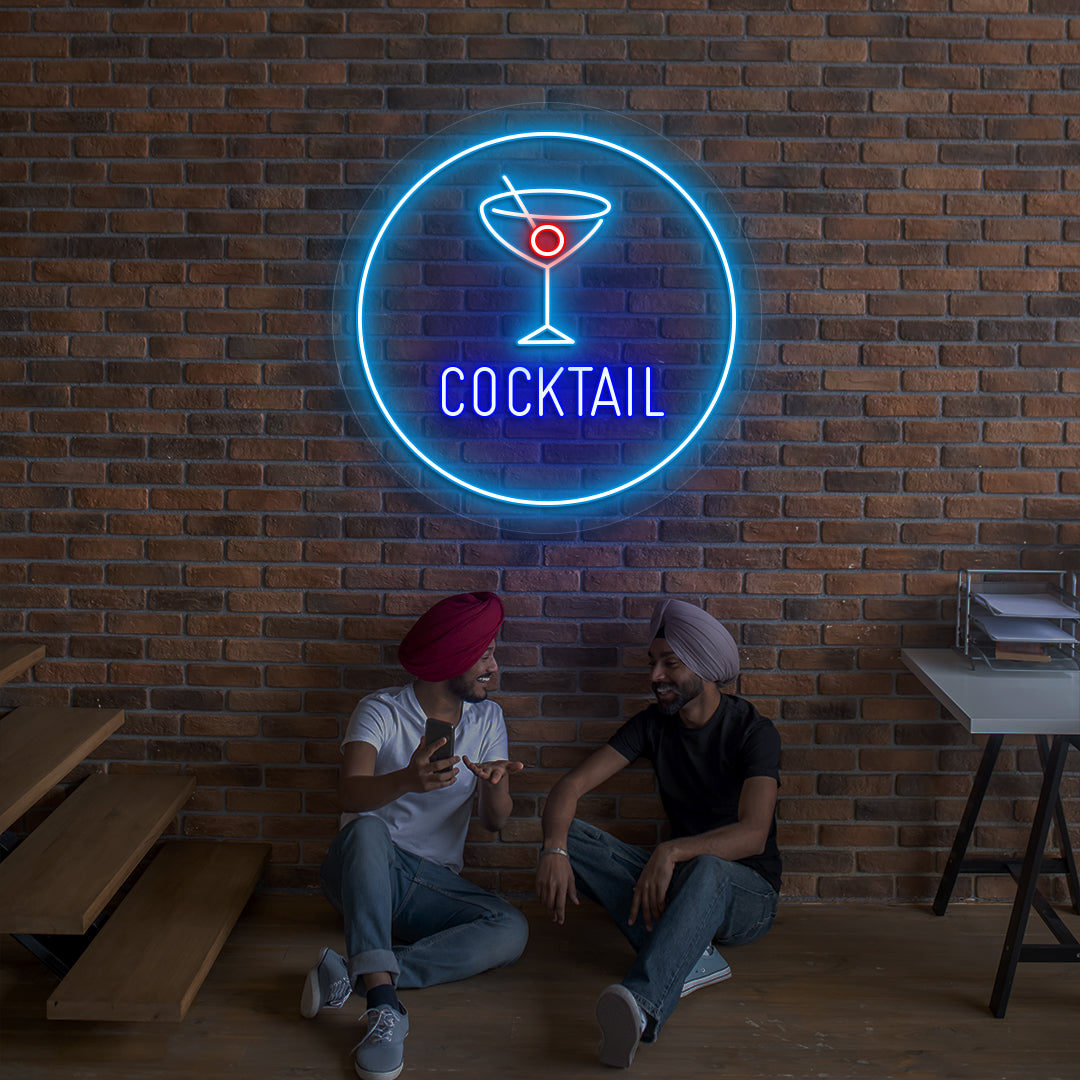 Image of a cocktail circle bar neon sign with cocktail glass glowing on wall in blue color