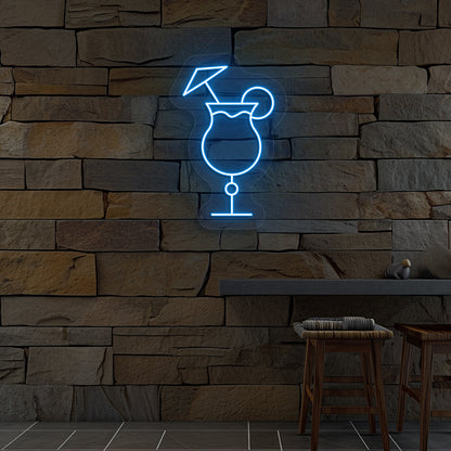 Image of a "cocktail glass with a lime" neon sign glowing on wall in ice blue color.