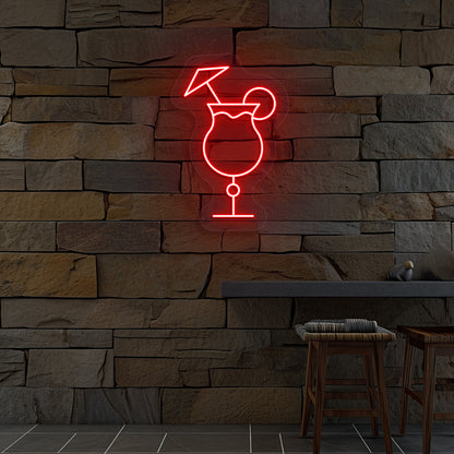 Image of a "cocktail glass with a lime" neon sign glowing on wall in red color.