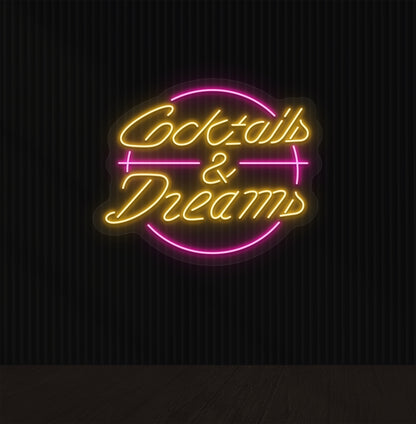 Lounge wall with cocktails and dream LED neon sign glowing orange.