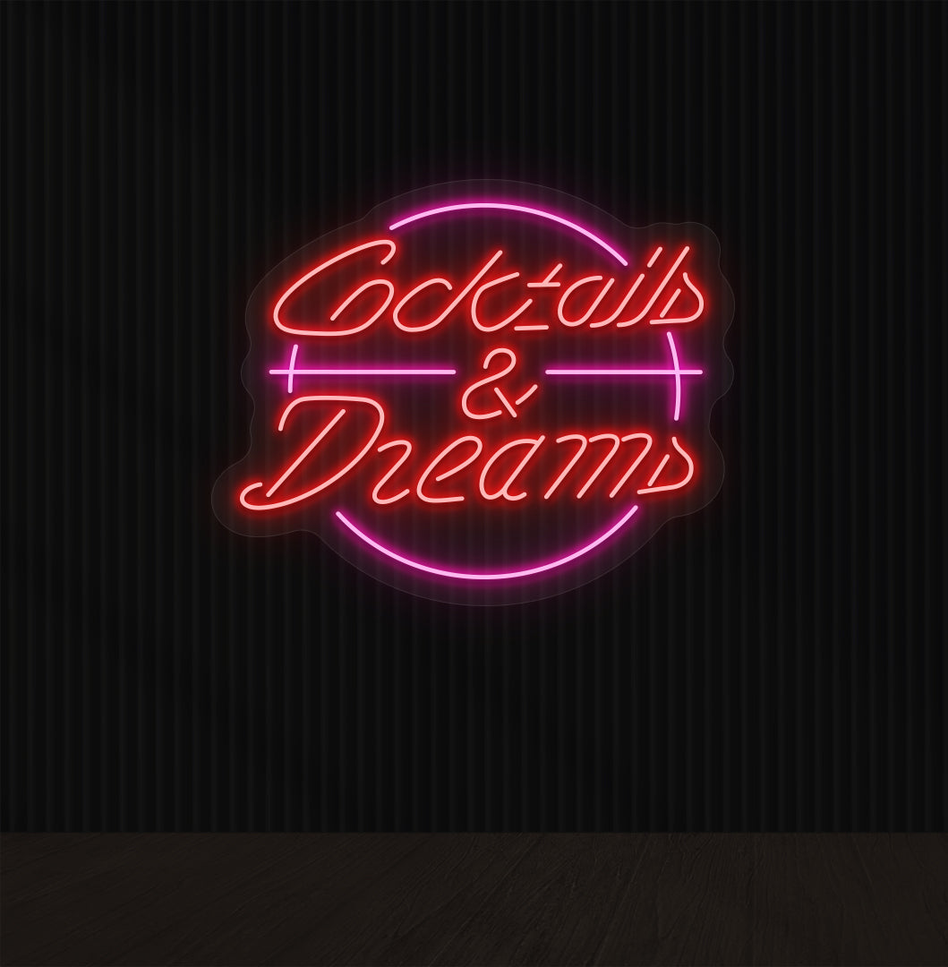 Image of a cocktails and dream LED neon sign on bar wall in red color.