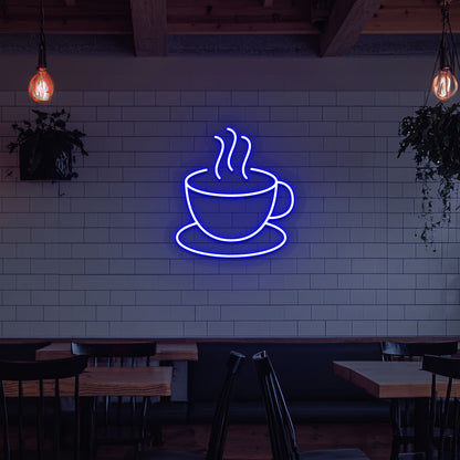 Stylish coffee mug neon sign in blue LED on cafe interior wall.