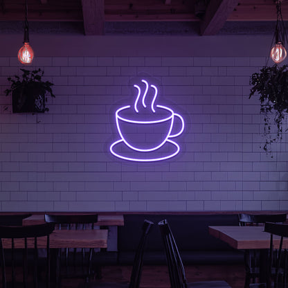 A bright purple LED coffee mug neon sign is mounted on the cafe wall. Perfect for coffee shops, bakeries, home coffee corners, and restaurants.