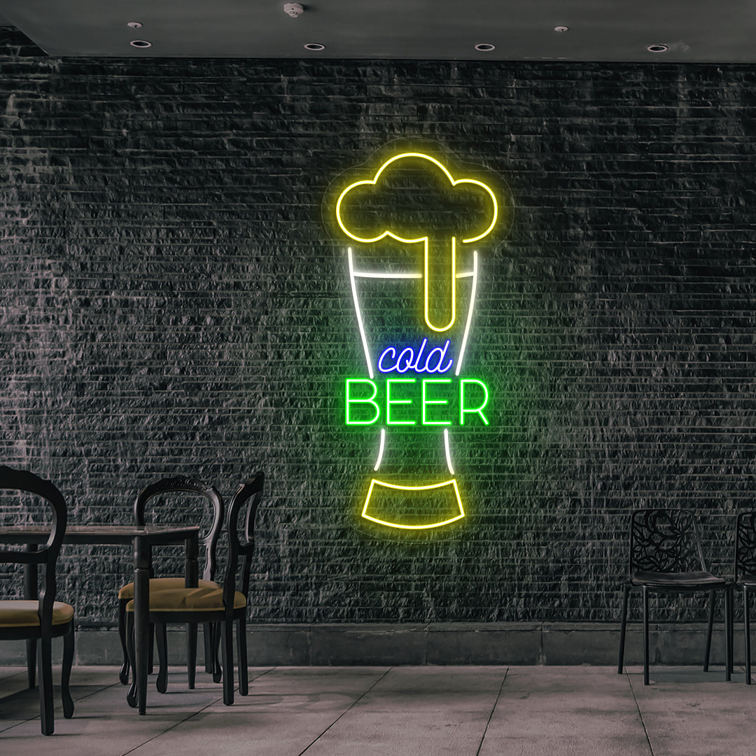 Image of a cold beer glass neon sign glowing on wall in multicolor.