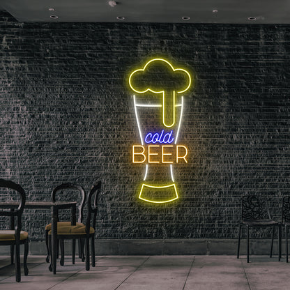Image of a cold beer glass neon sign glowing on wall in yellow, warm white, orange, blue color.
