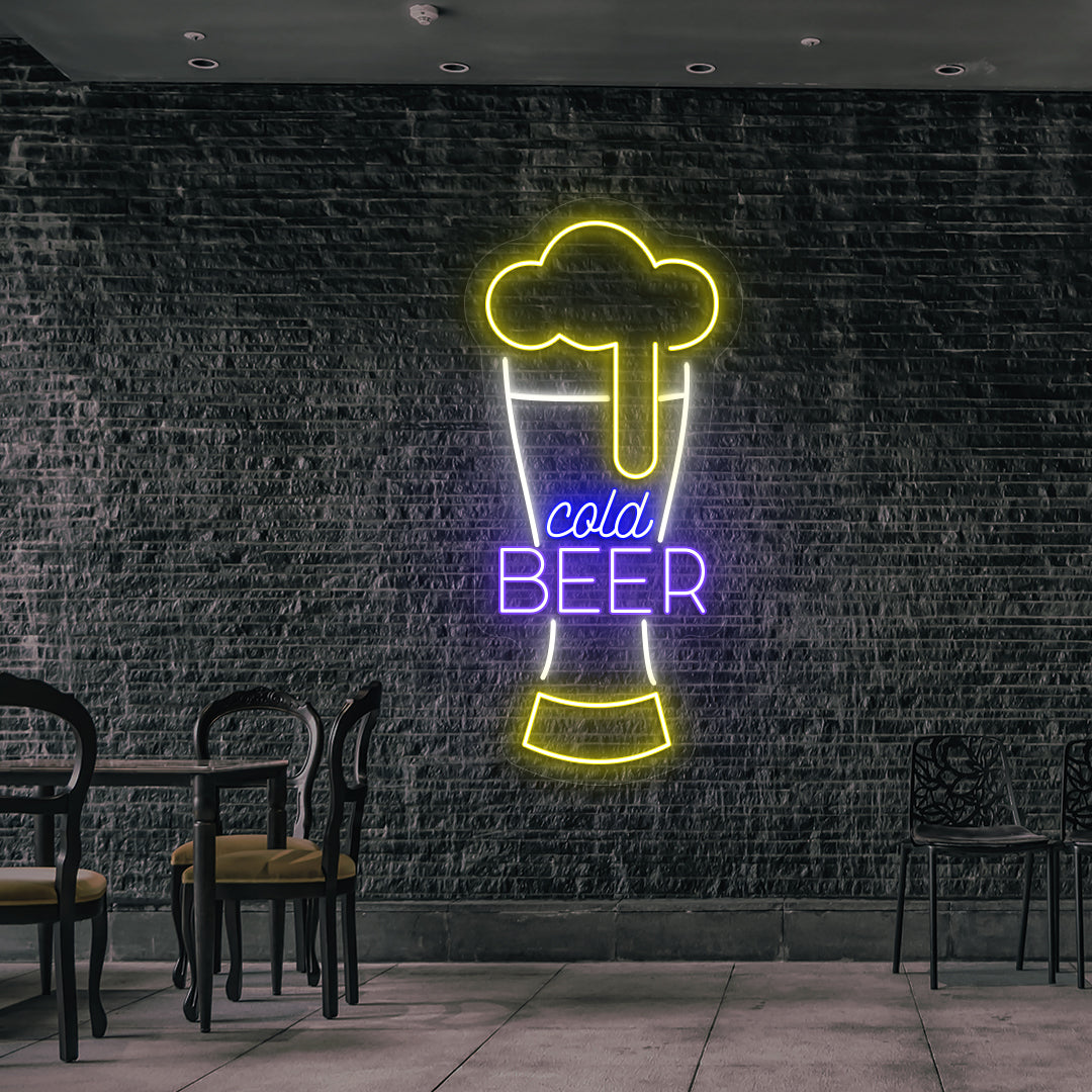 Image of a cold beer glass neon sign glowing on wall in yellow, warm white, purple, blue color.
