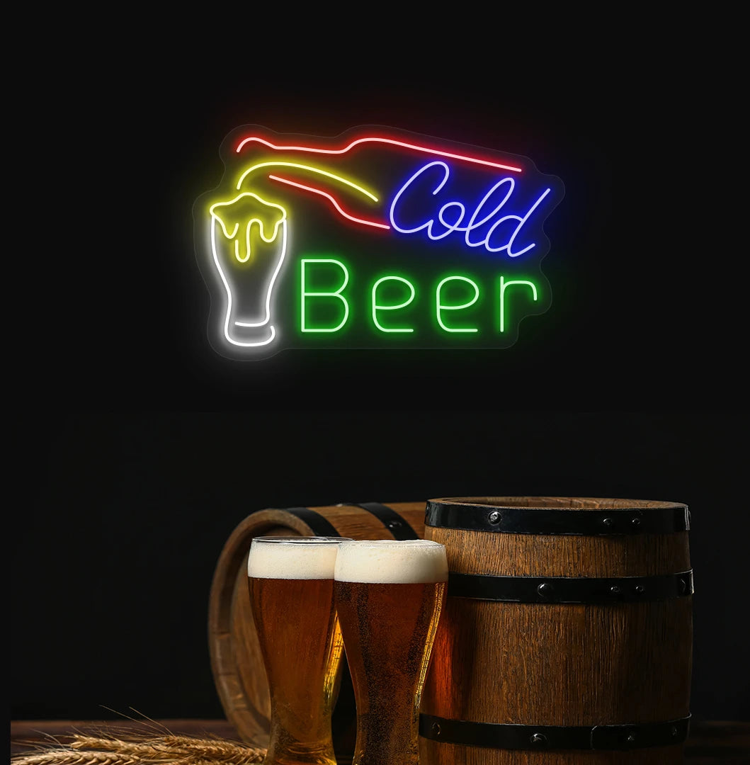 Modern aesthetic wall with cold beer neon sign glowing green with bottle and glass.