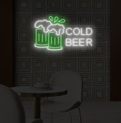A stylish green LED cold beer neon sign glowing on a bar wall with the beer glass setup.