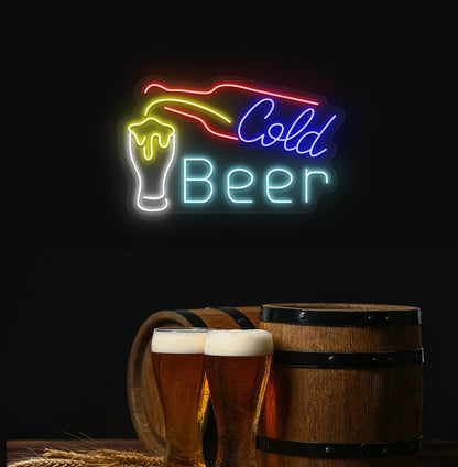 Cold beer neon sign with bottle and glass glowing on aesthetic wall in ice blue color.