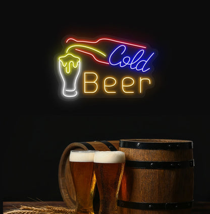 Modern aesthetic wall with cold beer neon sign glowing orange with bottle and glass.