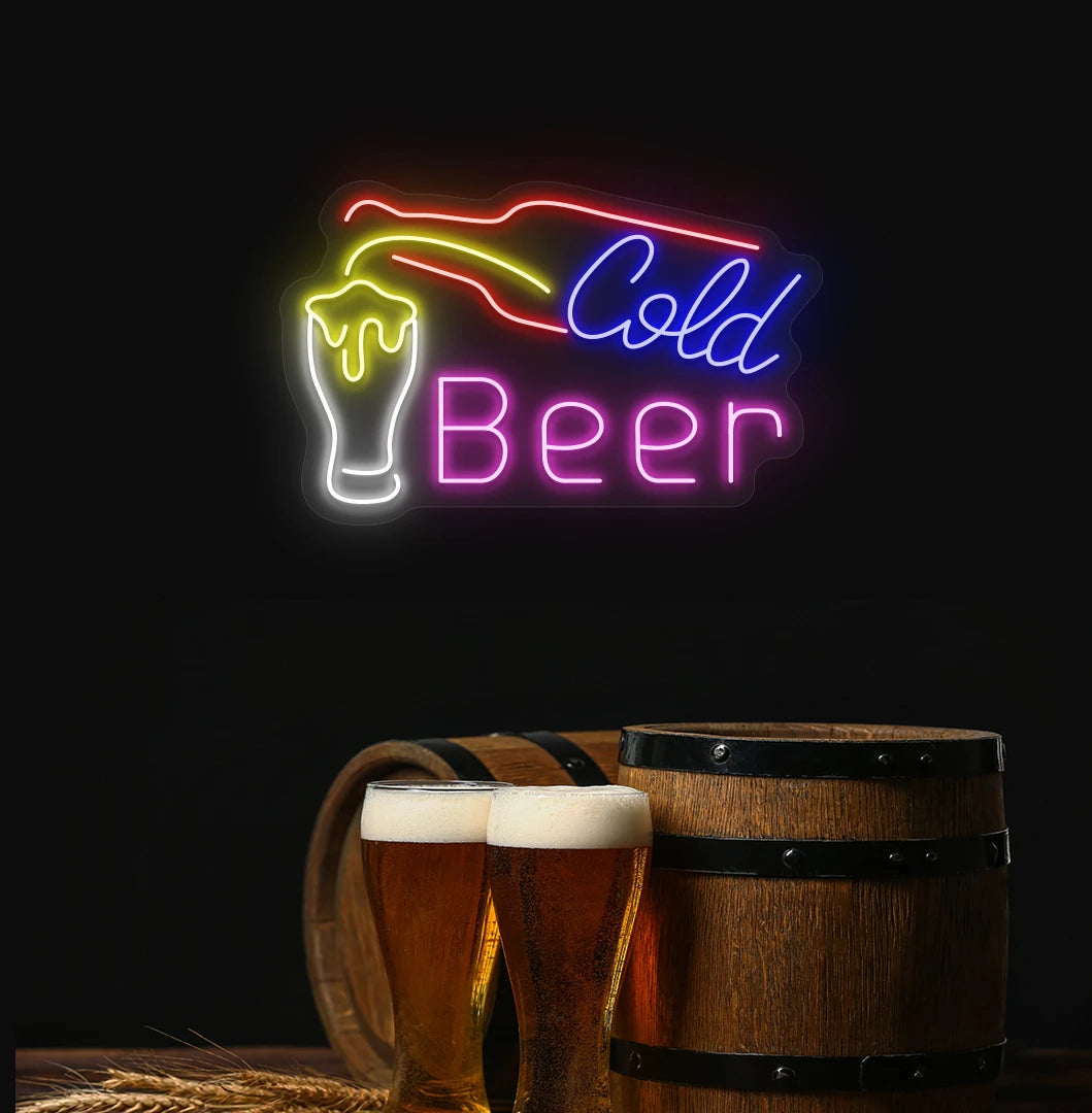 Cold beer neon sign with bottle and glass glowing on aesthetic wall in pink color.
