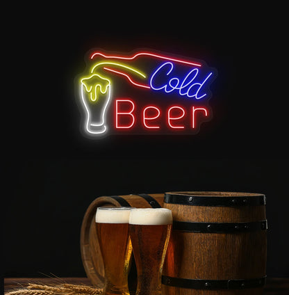 Cold beer neon sign with bottle and glass glowing on aesthetic wall in red color.