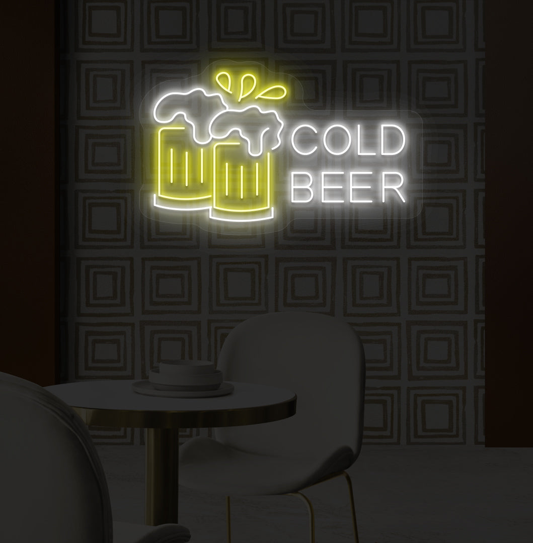 An image of a cold beer neon sign hanging on a wall, accompanied by yellow-colored beer glasses.