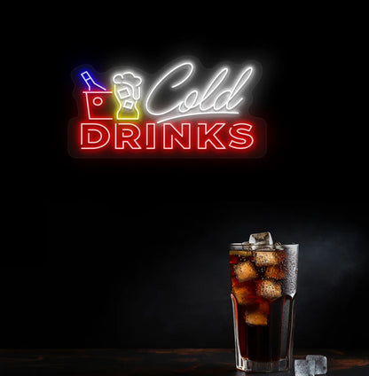 Modern wall decor with cold drinks neon sign glowing red.
