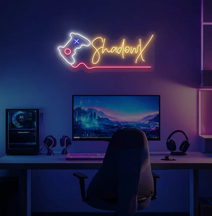 Controller with Custom Name neon sign glowing orange on gaming room wall.