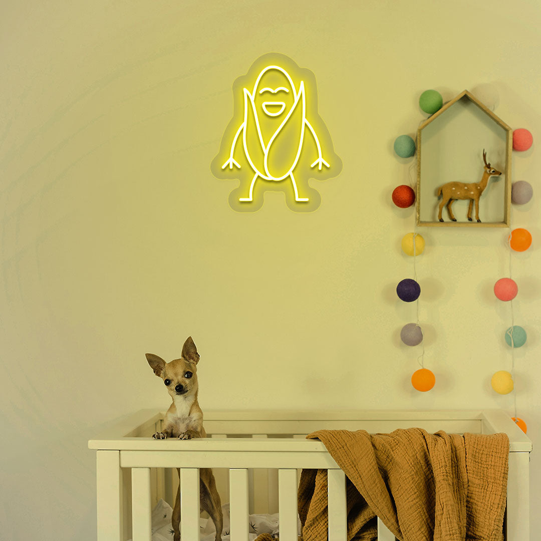 A stylish yellow LED corn neon sign is hanging on the kid's room wall.