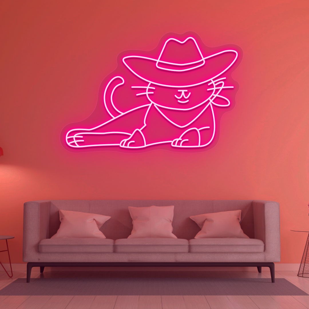 A stylish cowboy cat neon sign is glowing on the drawing room wall in pink.