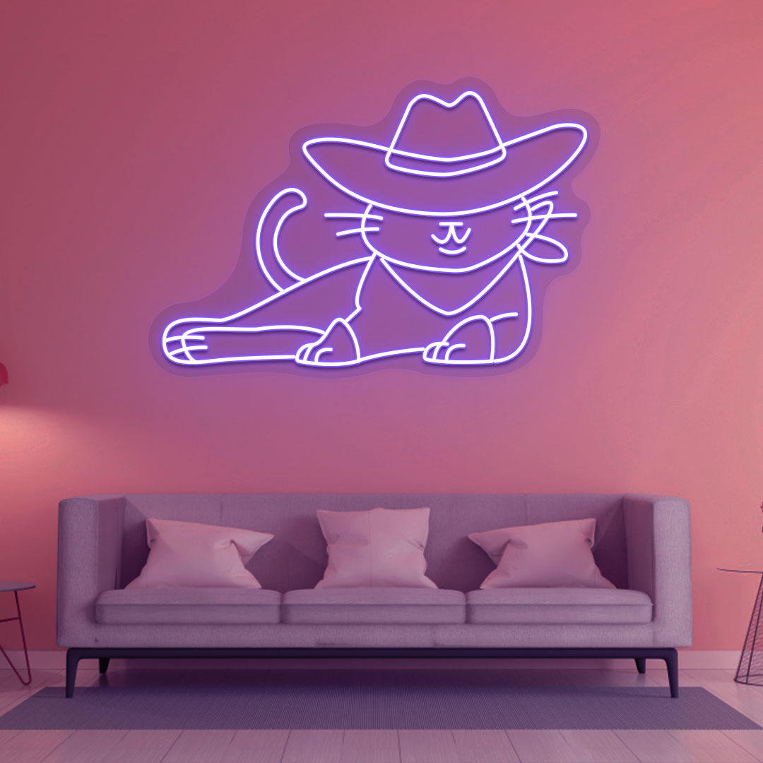 Cat with cowboy hat neon sign in blue on the wall. Perfect for living room décor and pet lovers’ spaces.