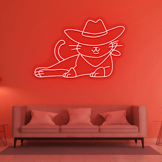 Image of a cowboy cat LED neon sign in red color mounted on a wall in a drawing room.