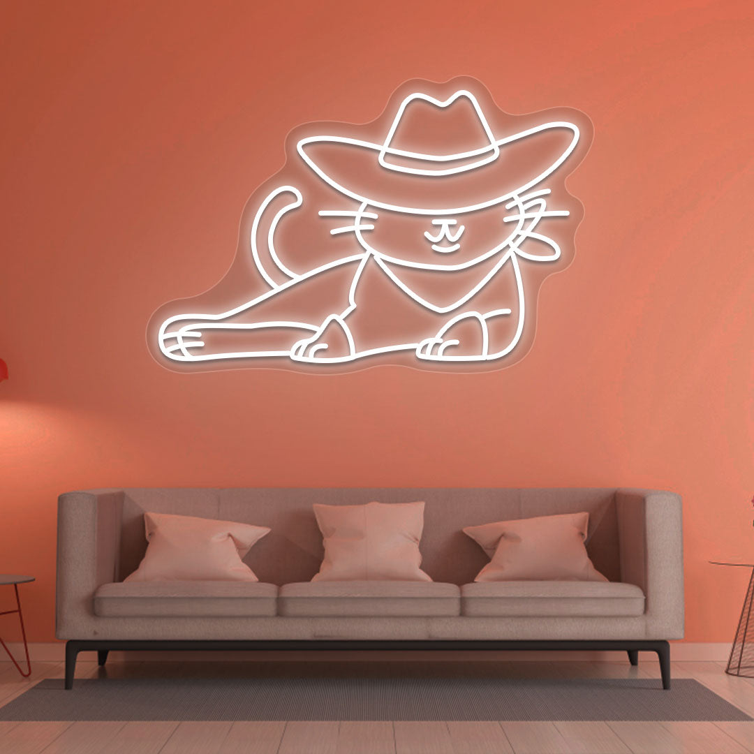 Image of a cowboy cat LED neon sign in white color mounted on a wall in a drawing room.