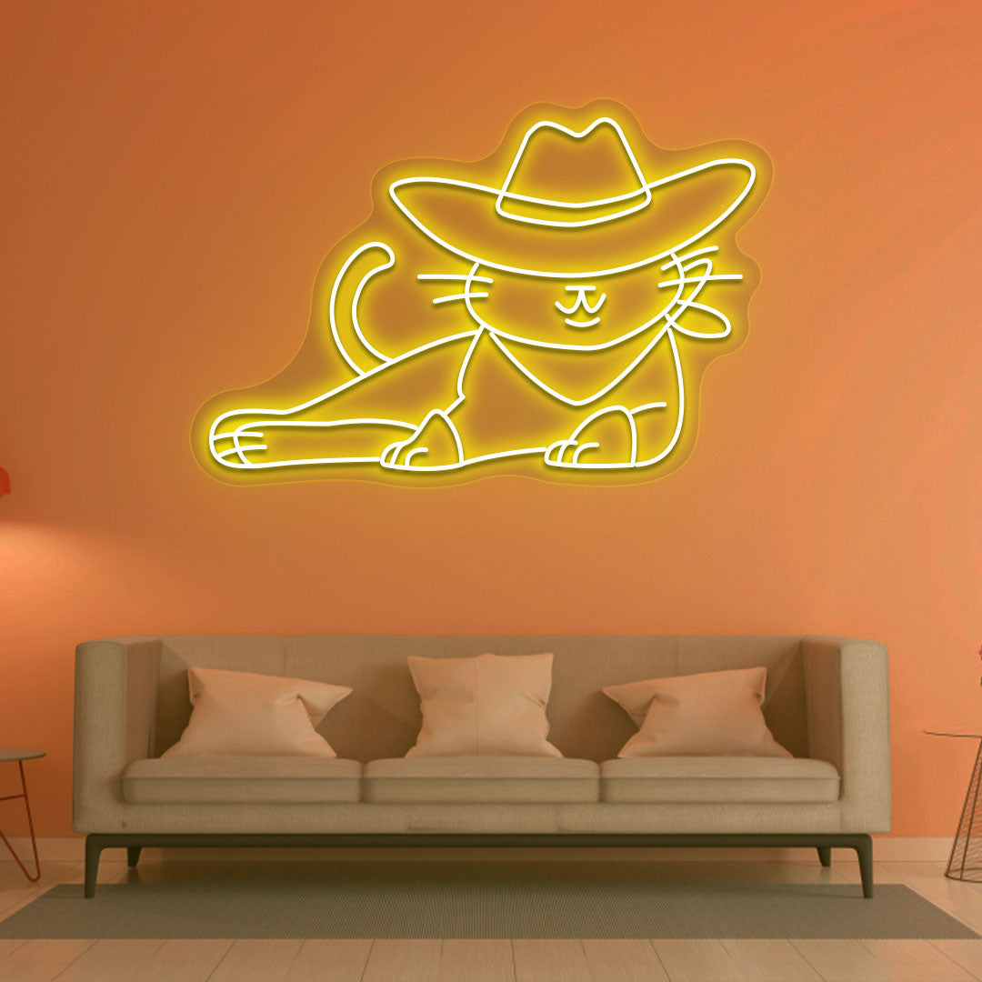 A stylish cowboy cat neon sign is glowing on the drawing room wall in yellow.