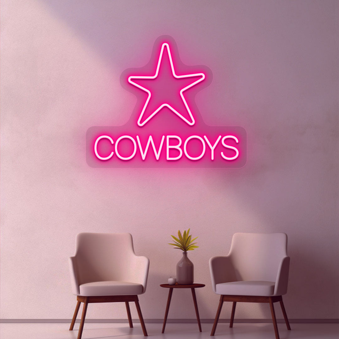 Image of a cowboy's LED neon sign with a star glowing on a room wall in pink.