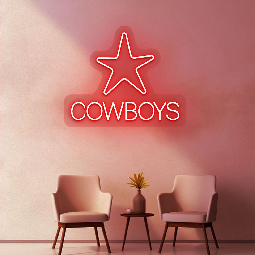 Image of a cowboy's LED neon sign with a star glowing on a room wall in red.