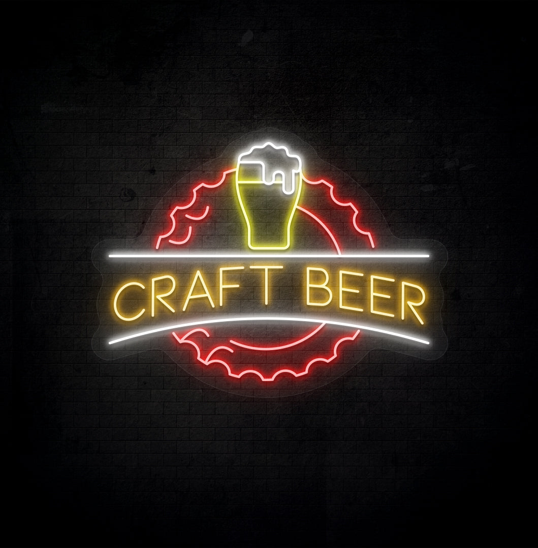 Stylish orange LED craft beer neon sign with beer design glowing on wall.