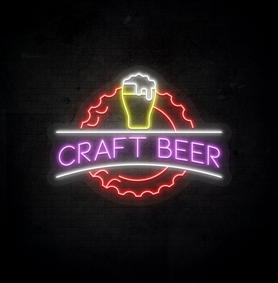 Stylish multicolor LED craft beer neon sign with beer design glowing on wall.