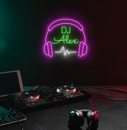 Stylish personalized DJ Name neon sign mounted on aesthetic wall in green color.