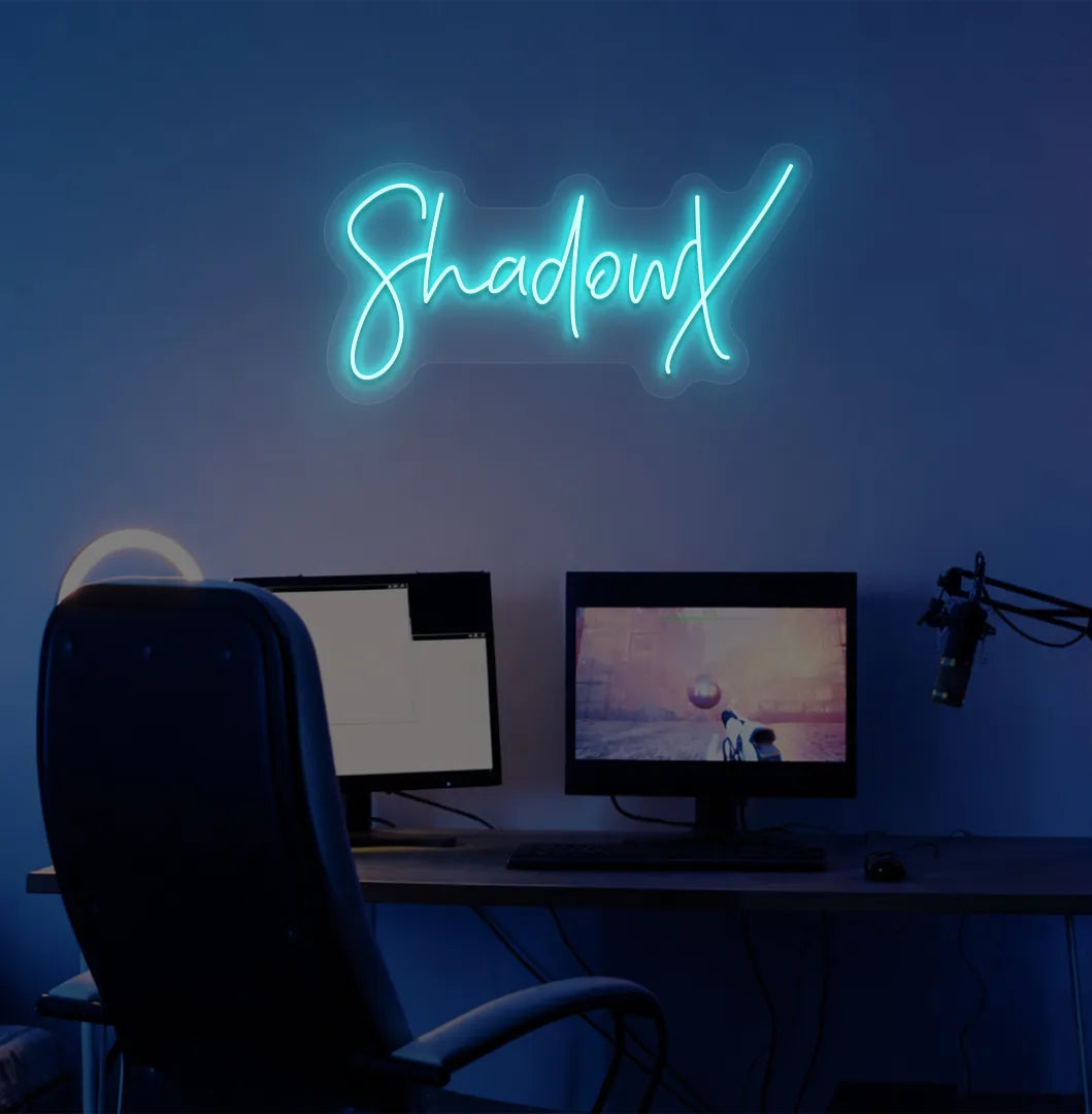 Custom gamer tag ice blue LED neon sign mounted on modern gaming wall.