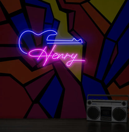 Personalized Guitar with Name neon sign in pink color mounted on modern wall decor.