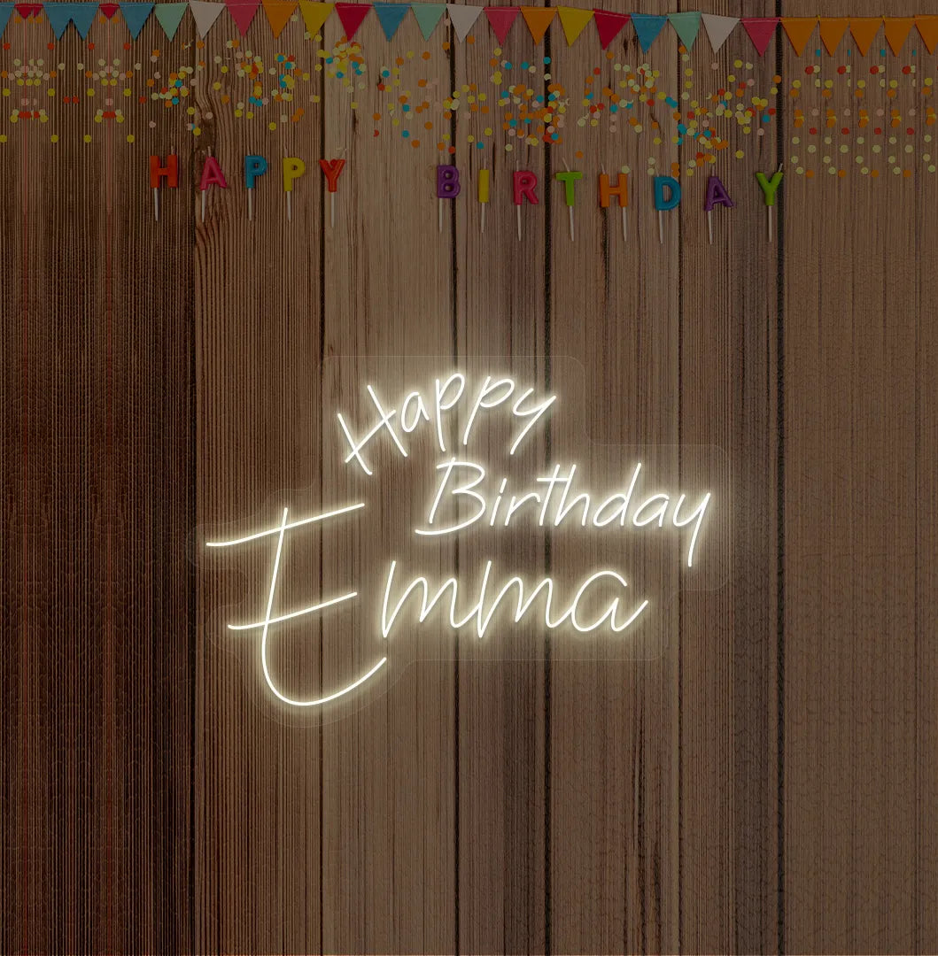 Personalized Happy Birthday Name neon sign mounted on modern birthday party backdrop wall in warm white color.
