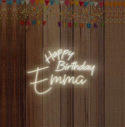 Personalized Happy Birthday Name neon sign mounted on modern birthday party backdrop wall in warm white color.
