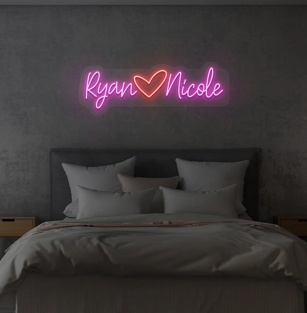 Personalized purple LED name sign mounted on modern bedroom wall.