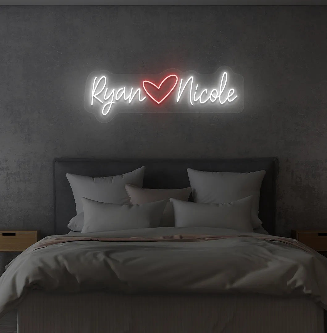 Custom Name neon sign with heart icon in white color on modern wall.